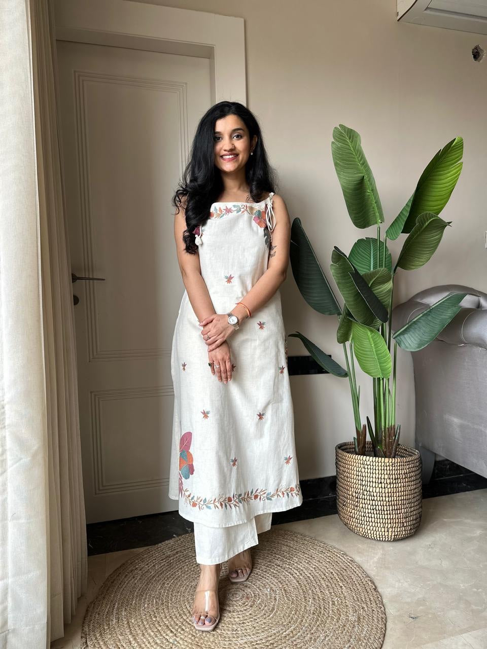 the sheer beautv of this sleeveless pant set A unique