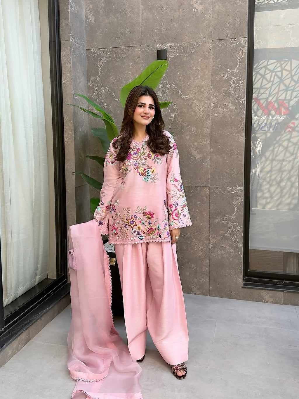 Model wearing Blush Pink floral embroidered farsi salwar suit