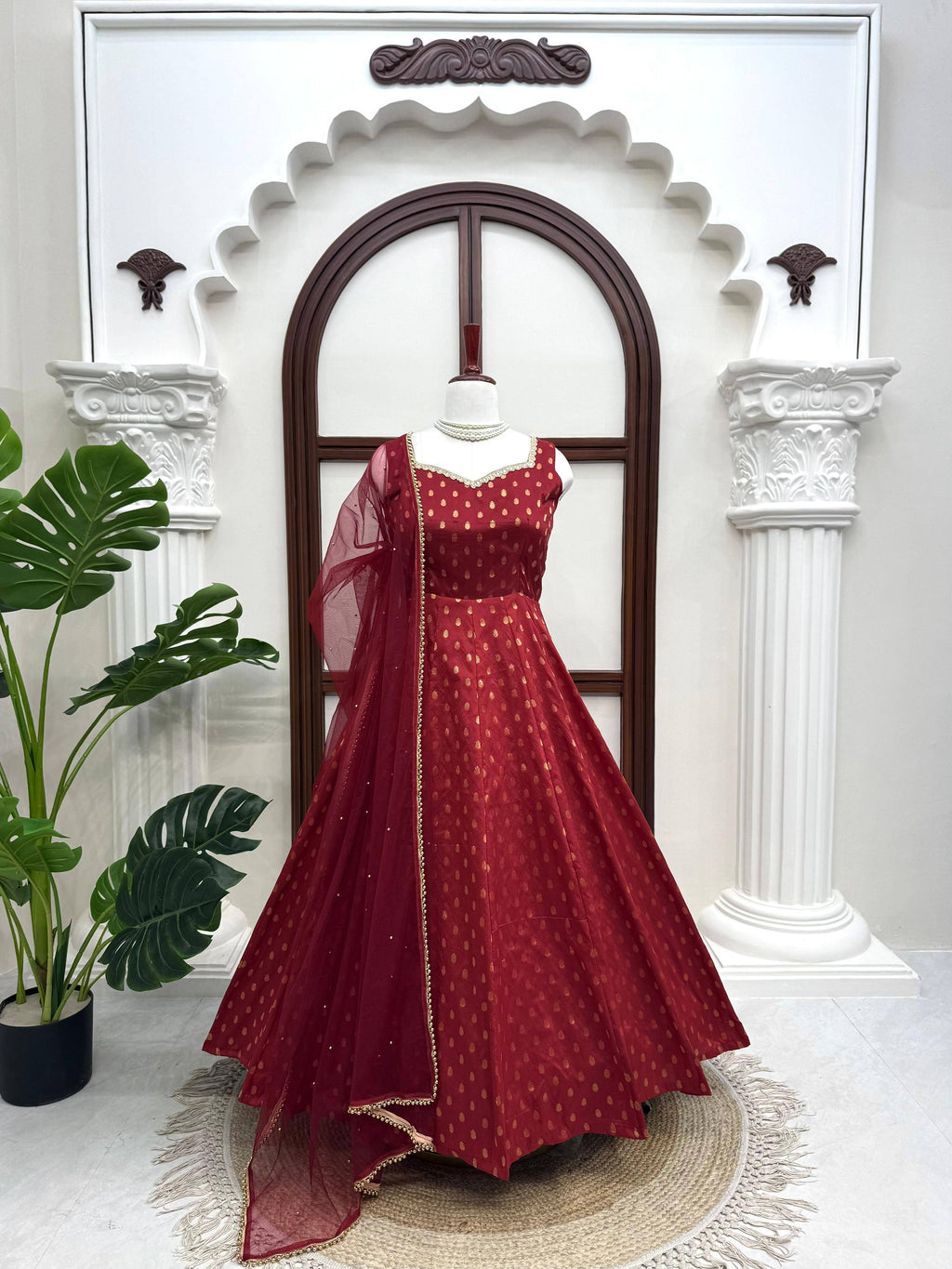 Maroon Chanderi Jacquard Anarkali Set angled front with net dupatta