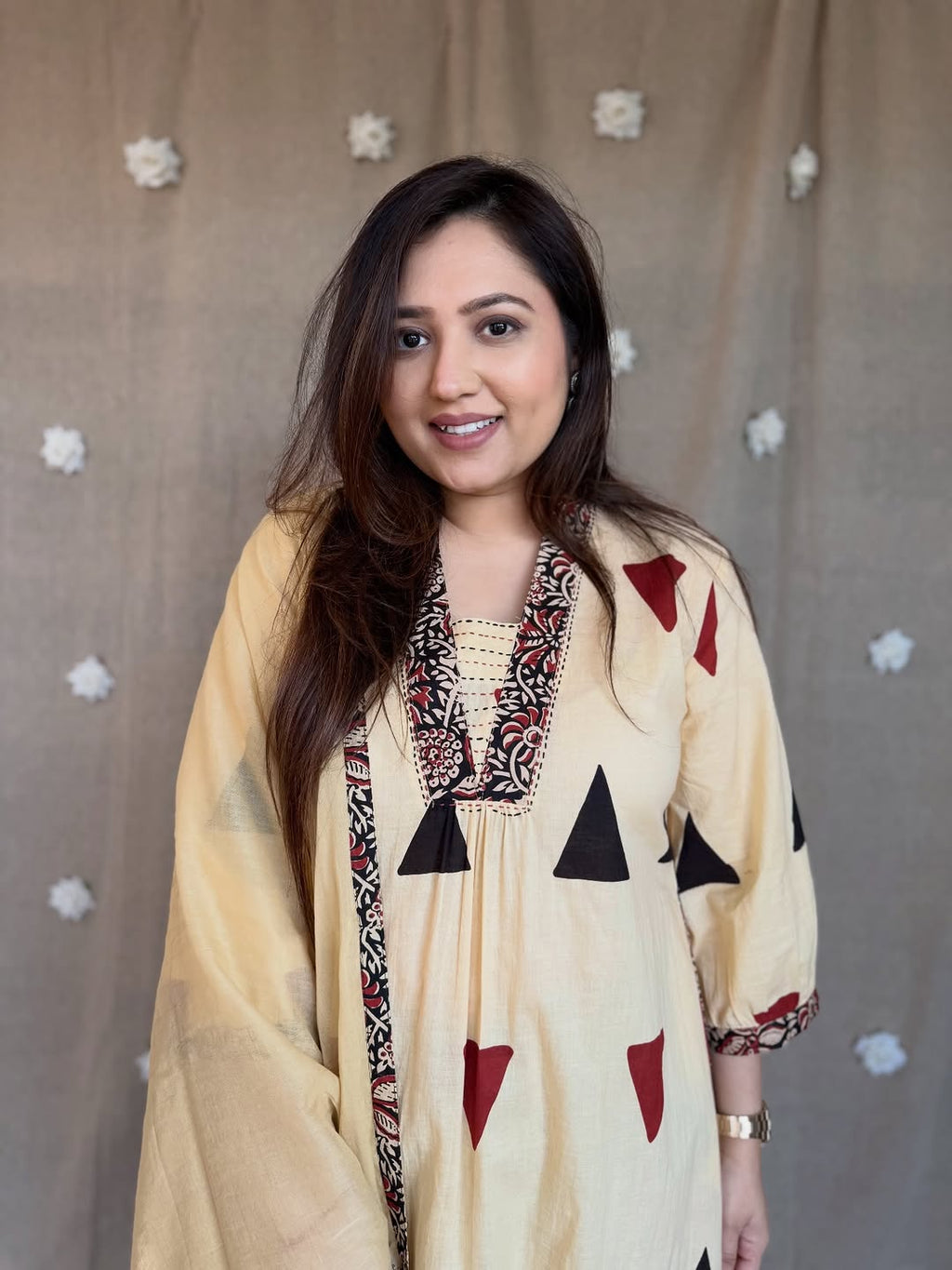 Close up view of Cream Beige Ajrakh print cotton suit set featuring jacquard neck detailing