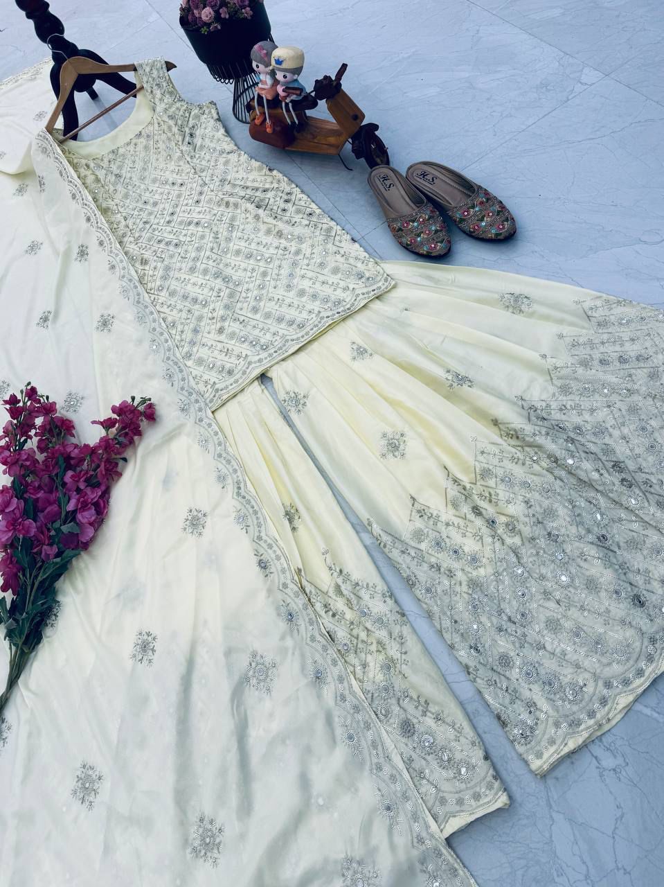 Cream Gold natural crape palazzo suit set with embroidered dupatta angled flat lay view