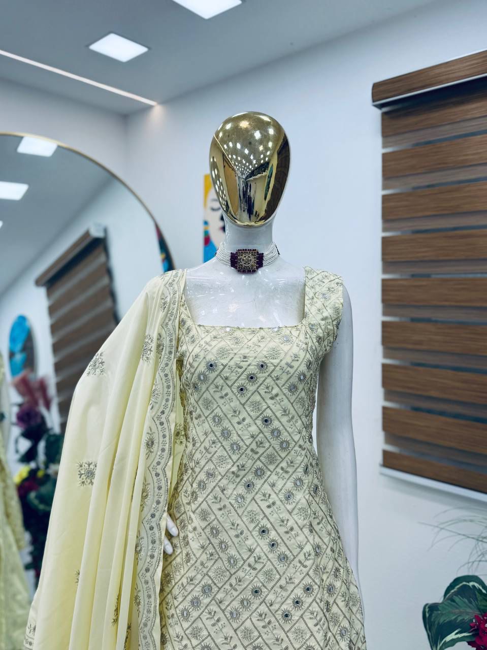 Cream Gold embroidered palazzo suit set displayed on mannequin close-up view