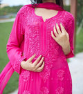 Neckline embroidery detail on rani pink faux georgette palazzo suit set