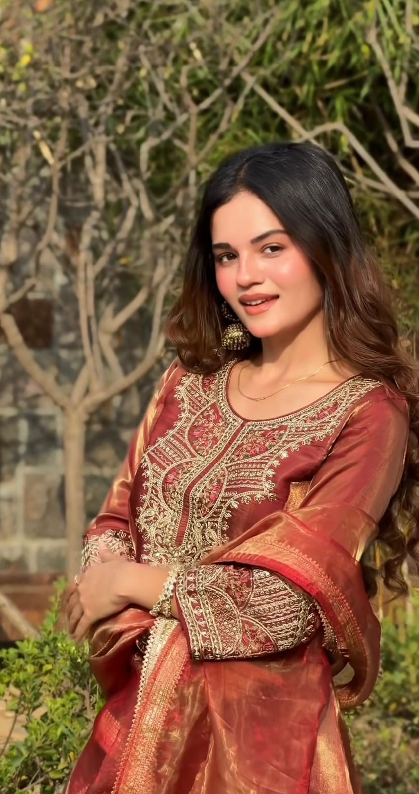 Close-up portrait showing embroidery sequence work on kurti