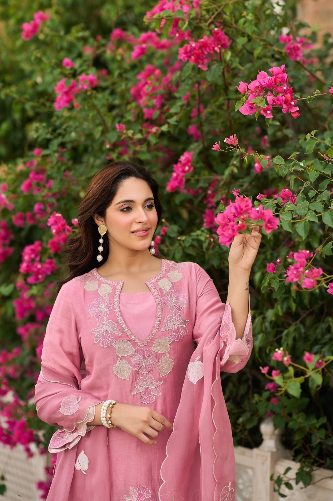 Full-length view of Dusty Rose Natural Satin embroidered sharara suit for festive wear