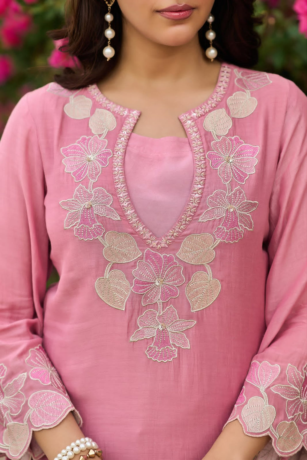 Close-up of Dusty Rose Natural Satin embroidered kurta featuring floral sequence embroidery and lace border neckline