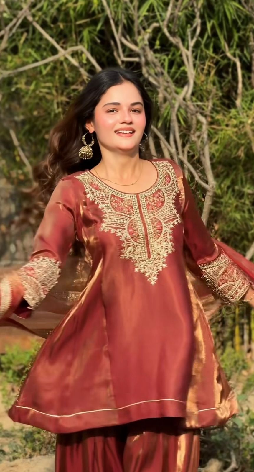 Front detail view of embroidered party wear kurti