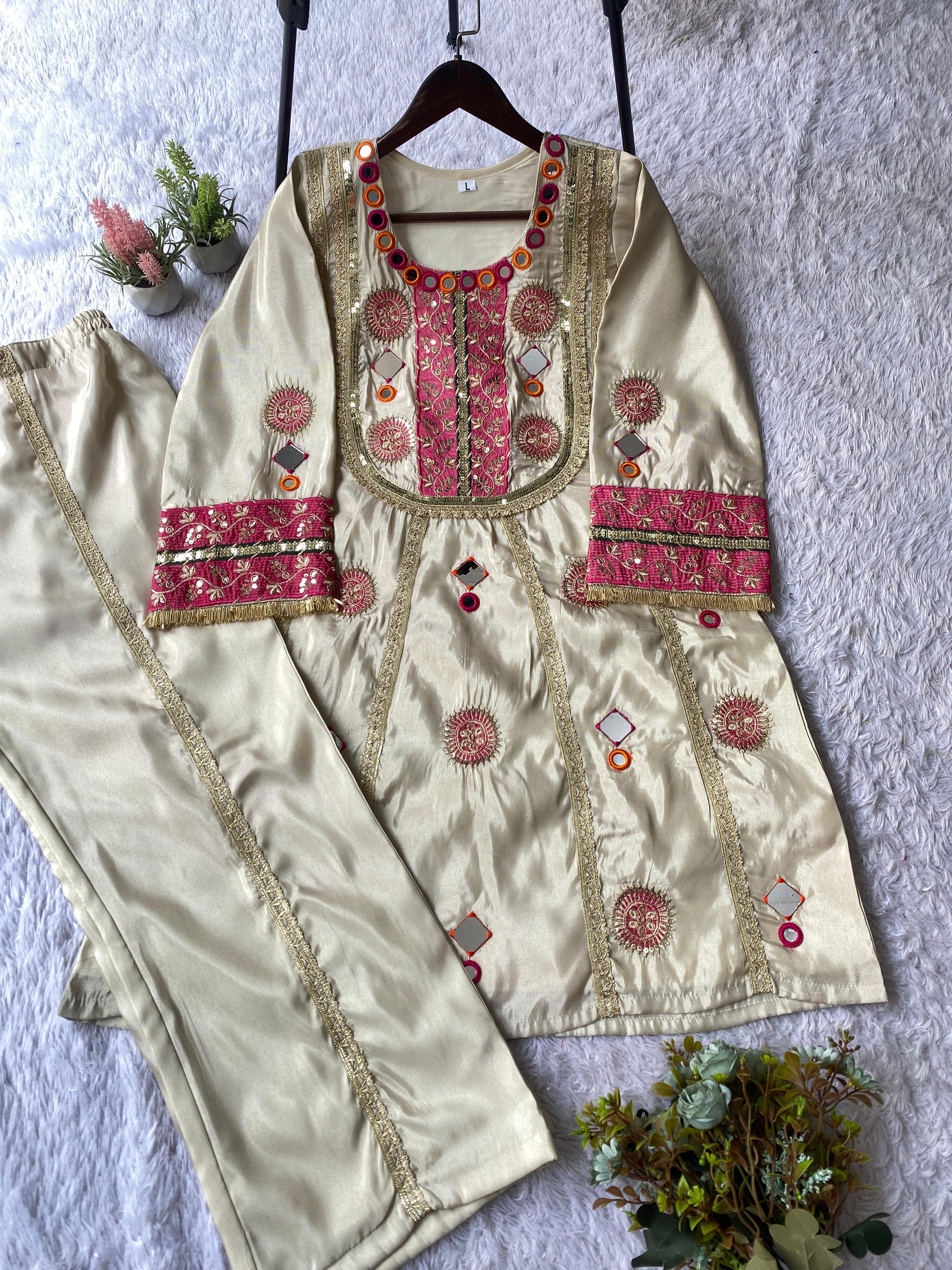 Complete flat lay of Ivory Cream embroidered co-ord set showing top and palazzo