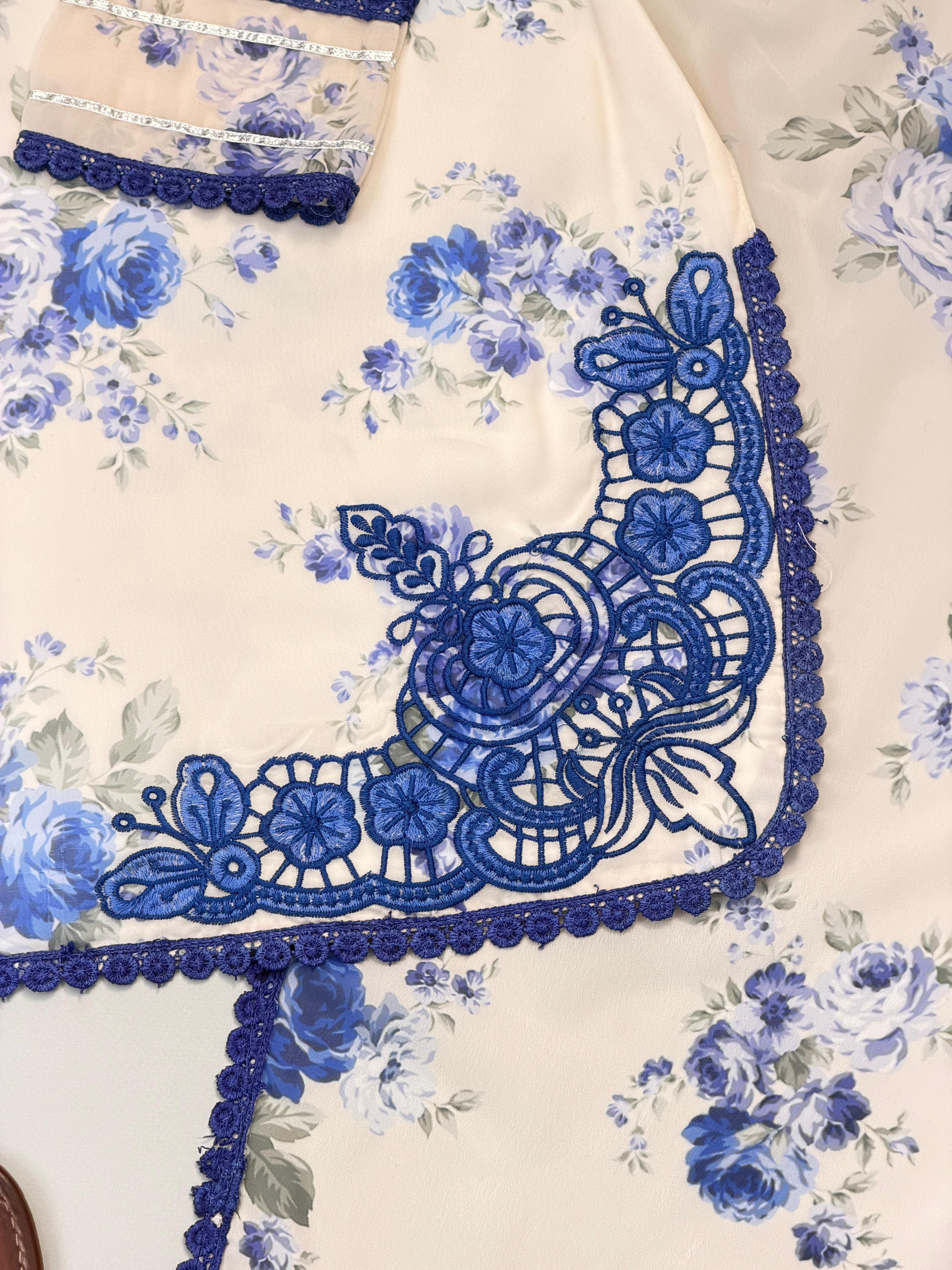 Close-up of Ivory Cream Faux Georgette dupatta showcasing royal blue embroidered border detail