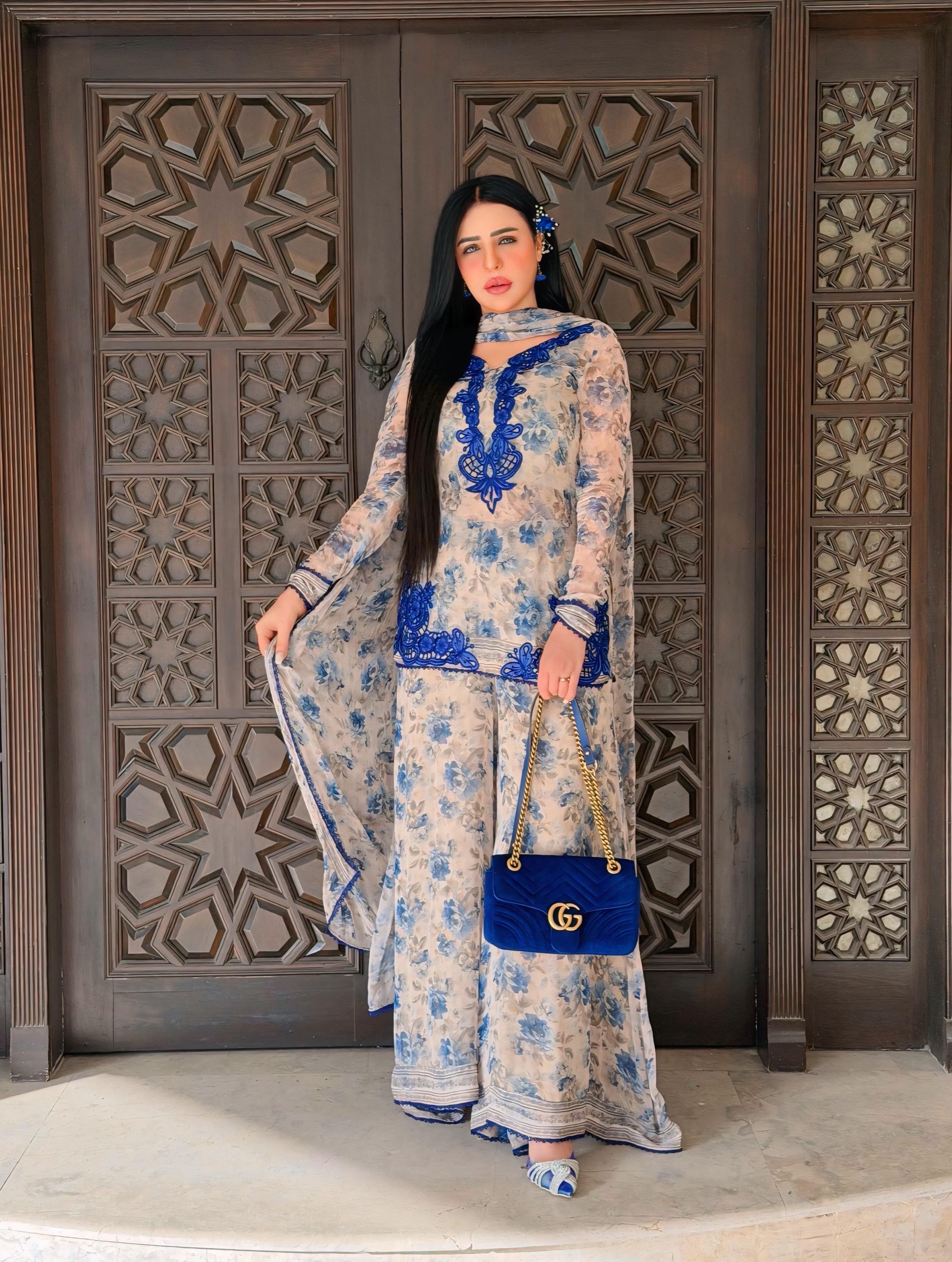 Women's Ivory Cream Heavy Faux Georgette embroidered palazzo suit with royal blue floral digital print and matching dupatta front view