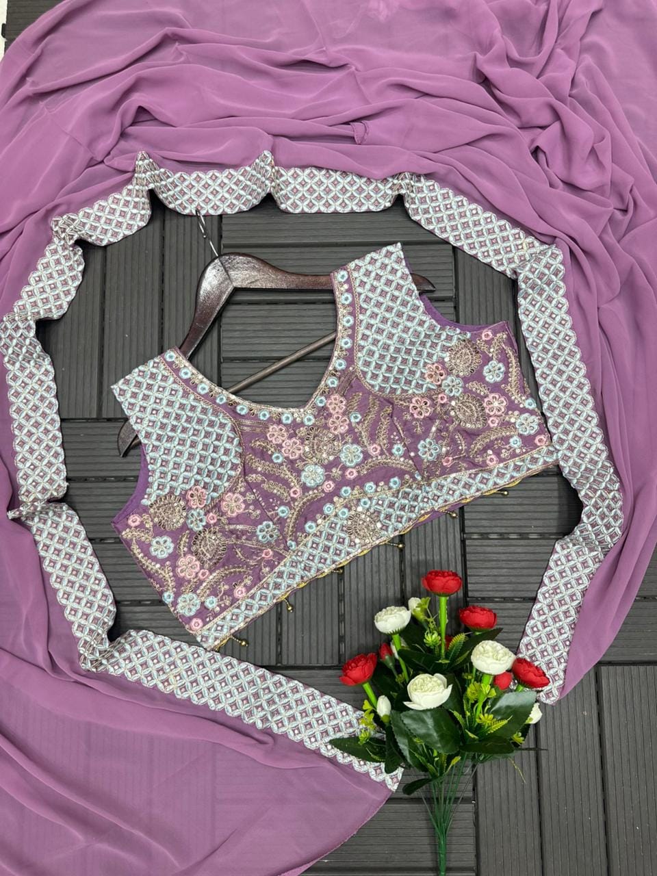 Lavender Purple embroidered shrug with sharara set flat lay arrangement