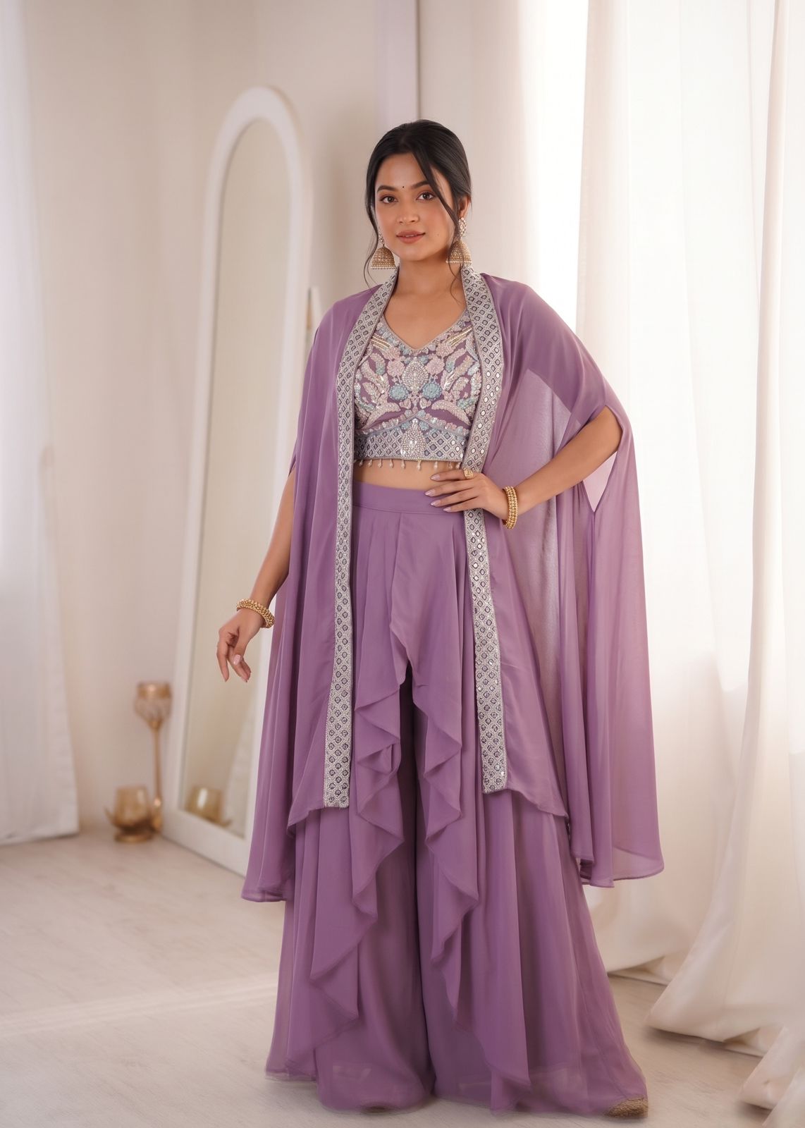 Model wearing Lavender Purple party wear shrug with sharara set