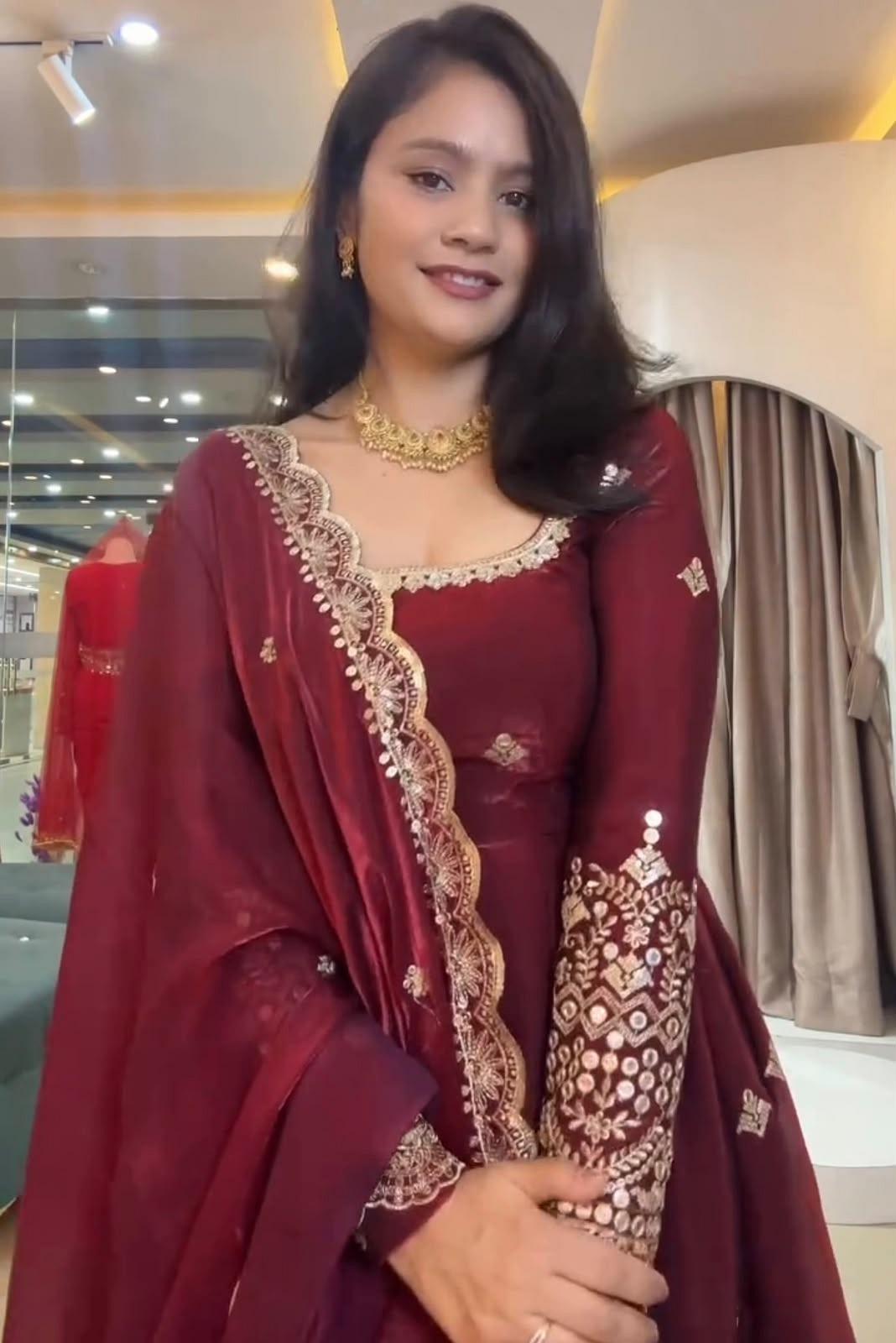 Maroon Fandy Silk Gown Pearl Work Neckline and Embroidery Detail