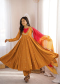 Women's Mustard Gold embroidered Roman Silk Anarkali suit displaying elegant flare with Kota Checks dupatta