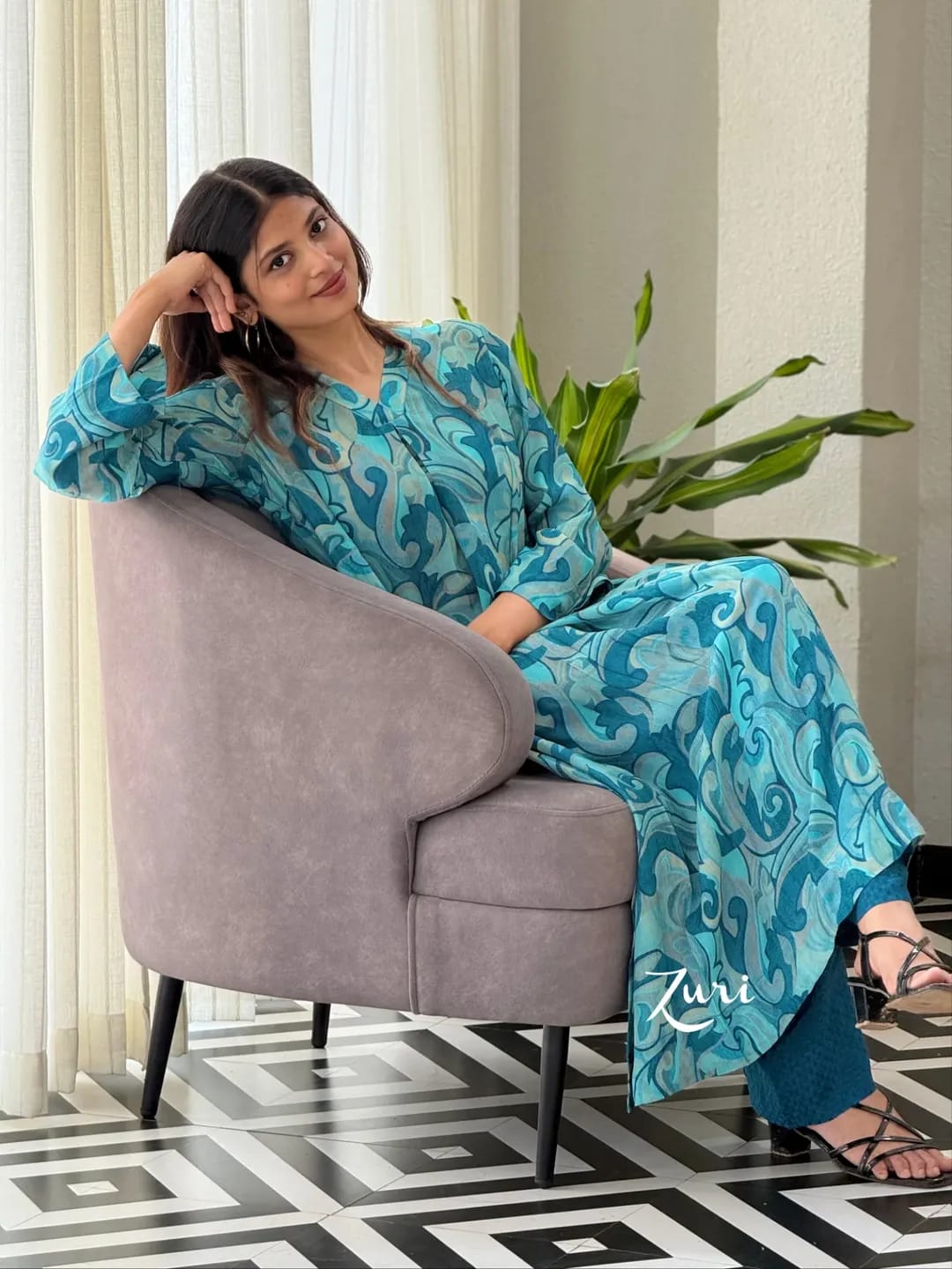 Woman wearing Ocean Teal Softy Premium Chiffon Silk abstract print Anarkali gown with matching pant set