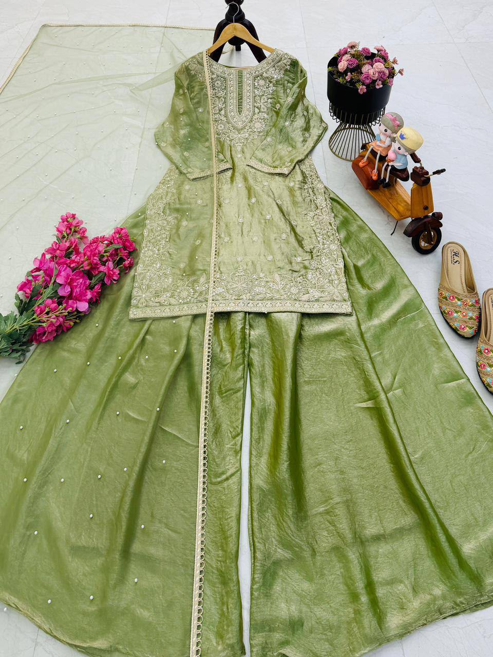 Complete Pistachio Green Designer Fandy Silk embroidered palazzo suit set with soft net dupatta flat lay