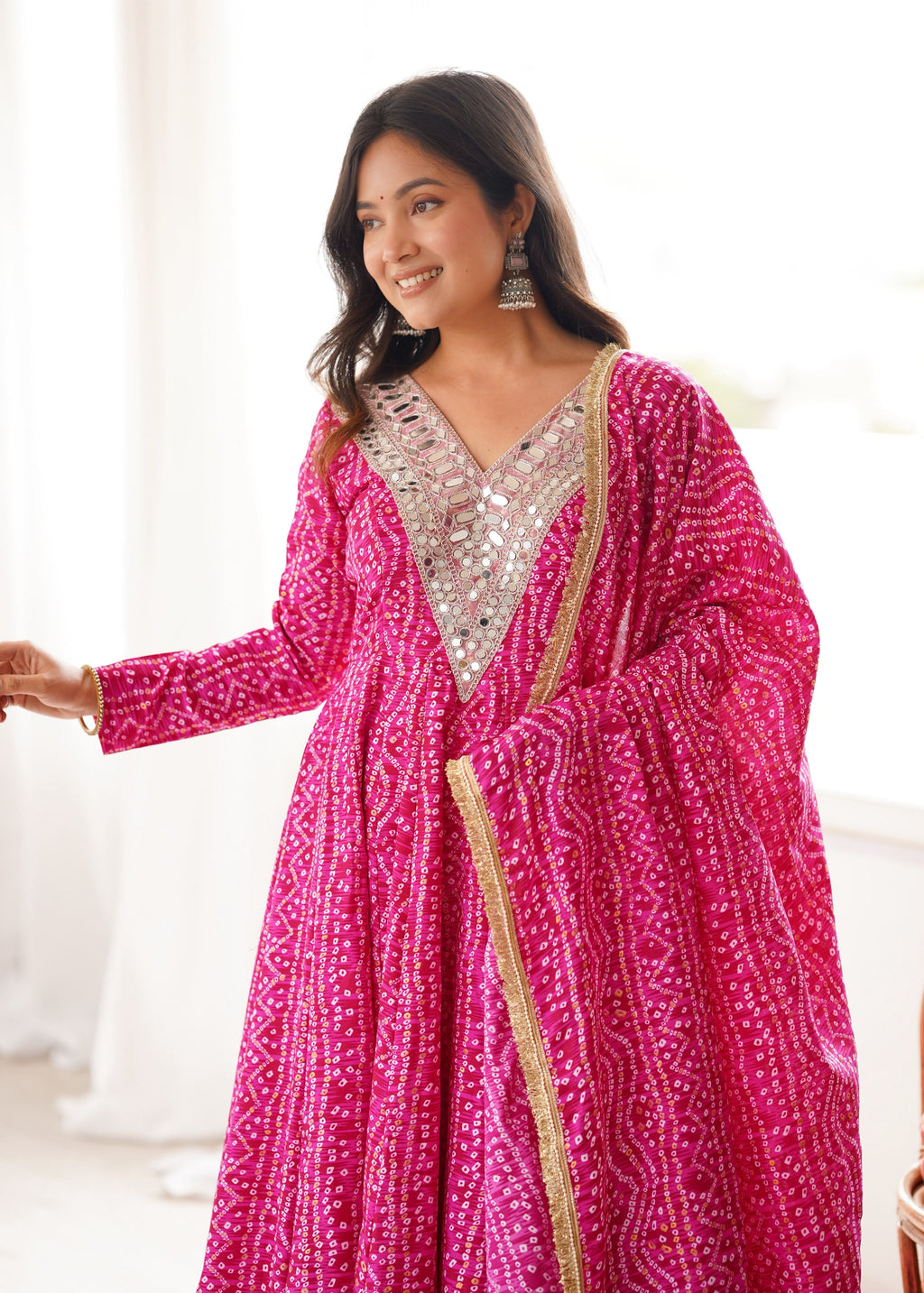Close-up view of Rani Pink mirror embroidery gown neckline