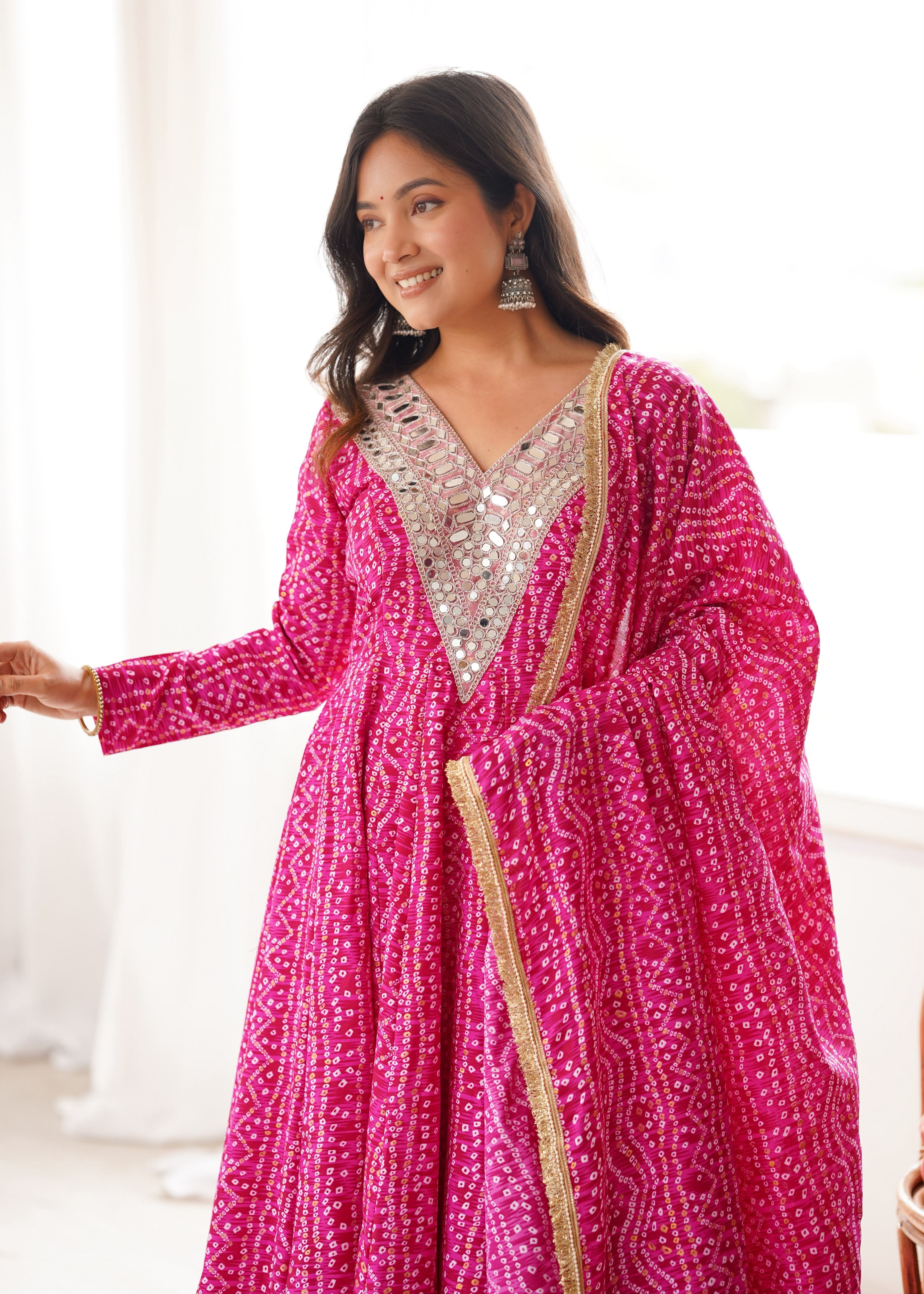 Close-up view of Rani Pink mirror embroidery gown neckline