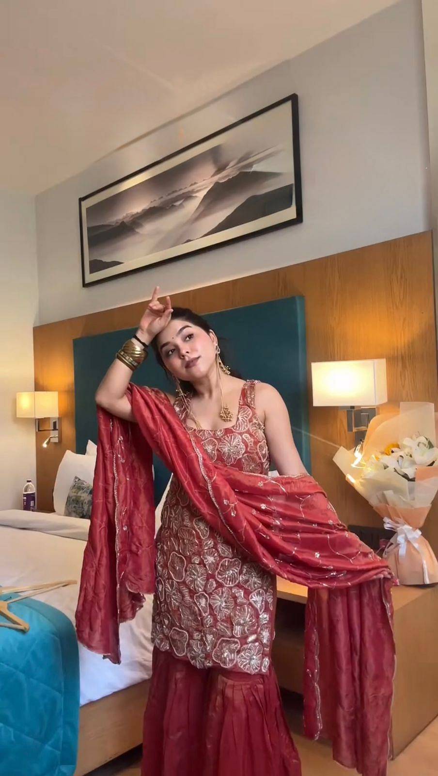 Red Simmer Silk Sharara Suit Set model front view with embroidered dupatta
