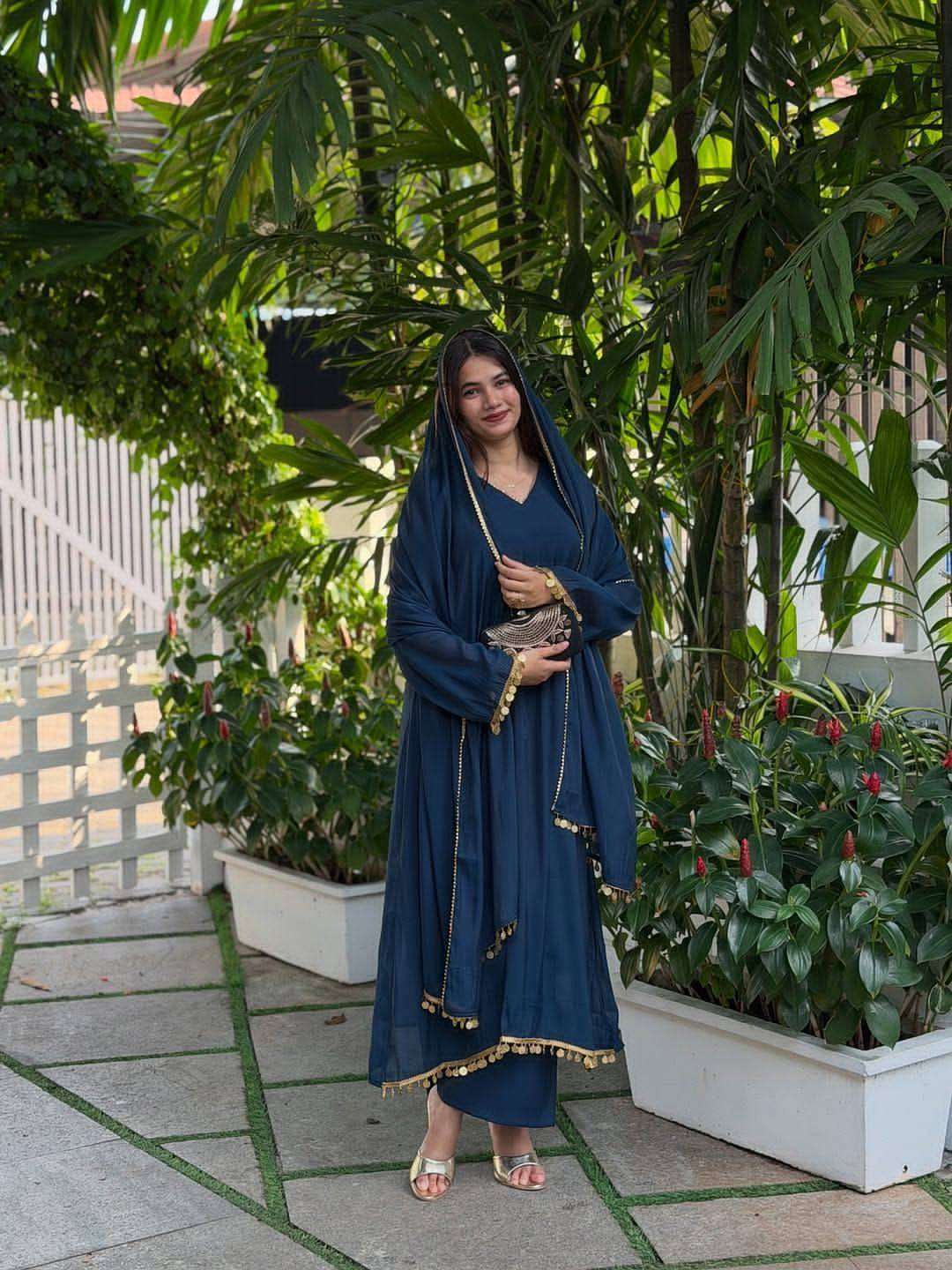 Model showcasing Navy Blue Roman Silk Kurti Pant Set