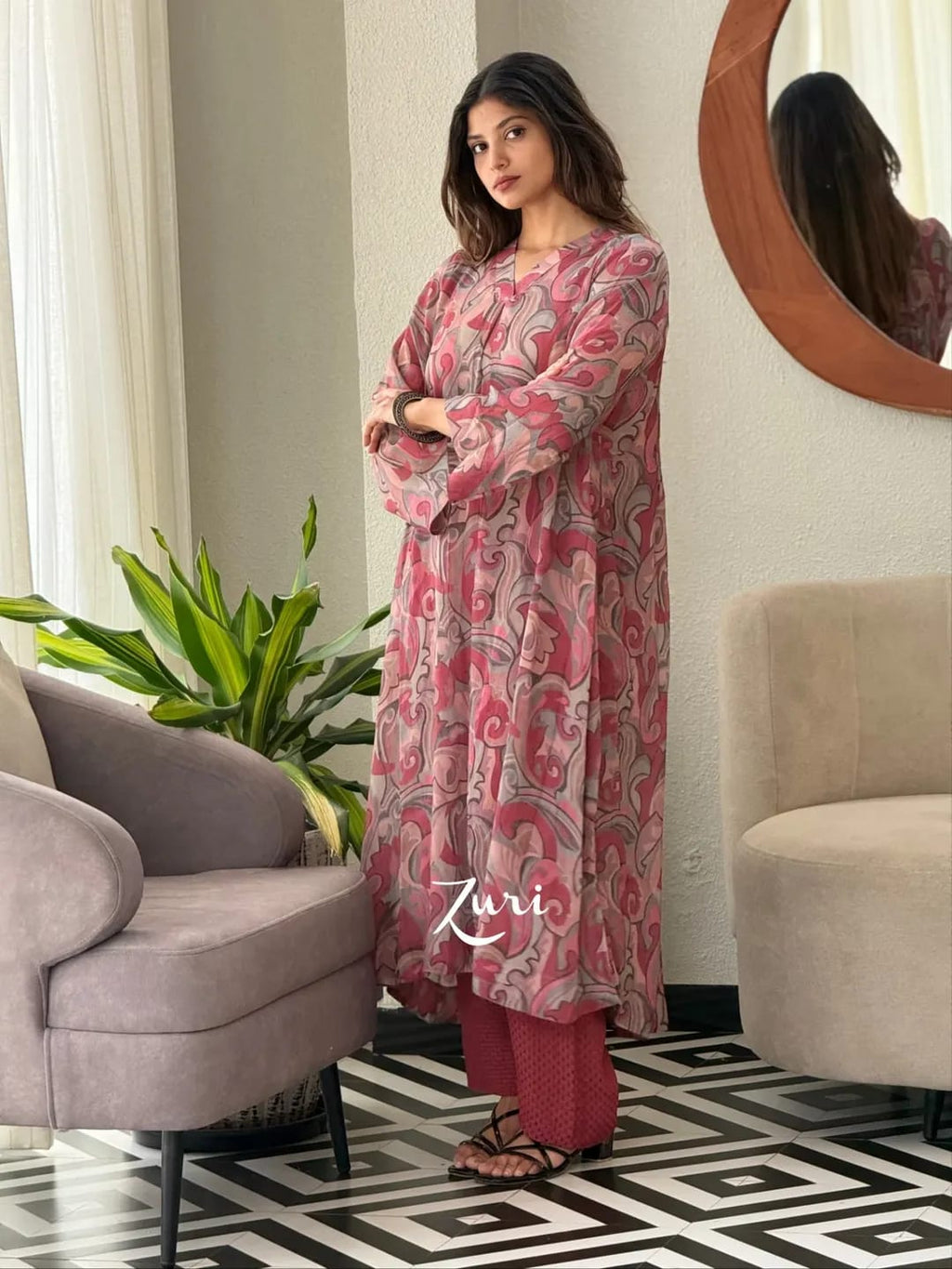 Woman wearing Rose Pink Softy Premium Chiffon Silk abstract print Anarkali gown with matching pant set