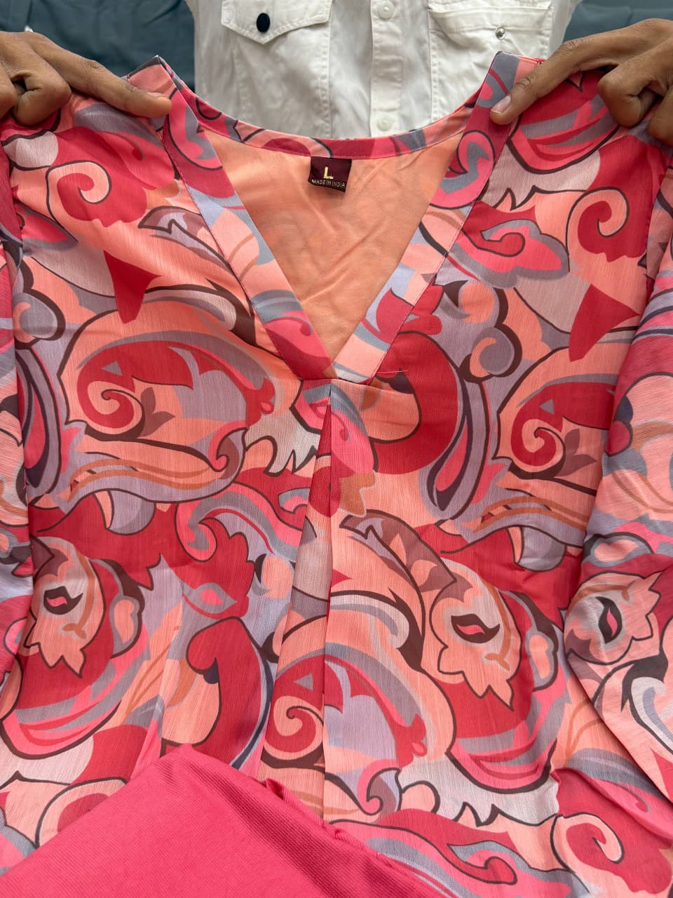 V-neck detail of Rose Pink Softy Premium Chiffon Silk abstract print Anarkali gown