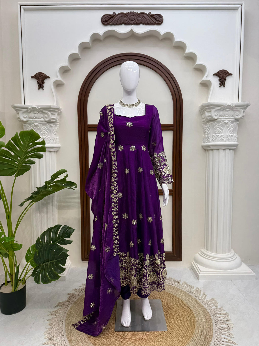 Royal Purple embroidered Anarkali suit set with matching dupatta displayed on mannequin