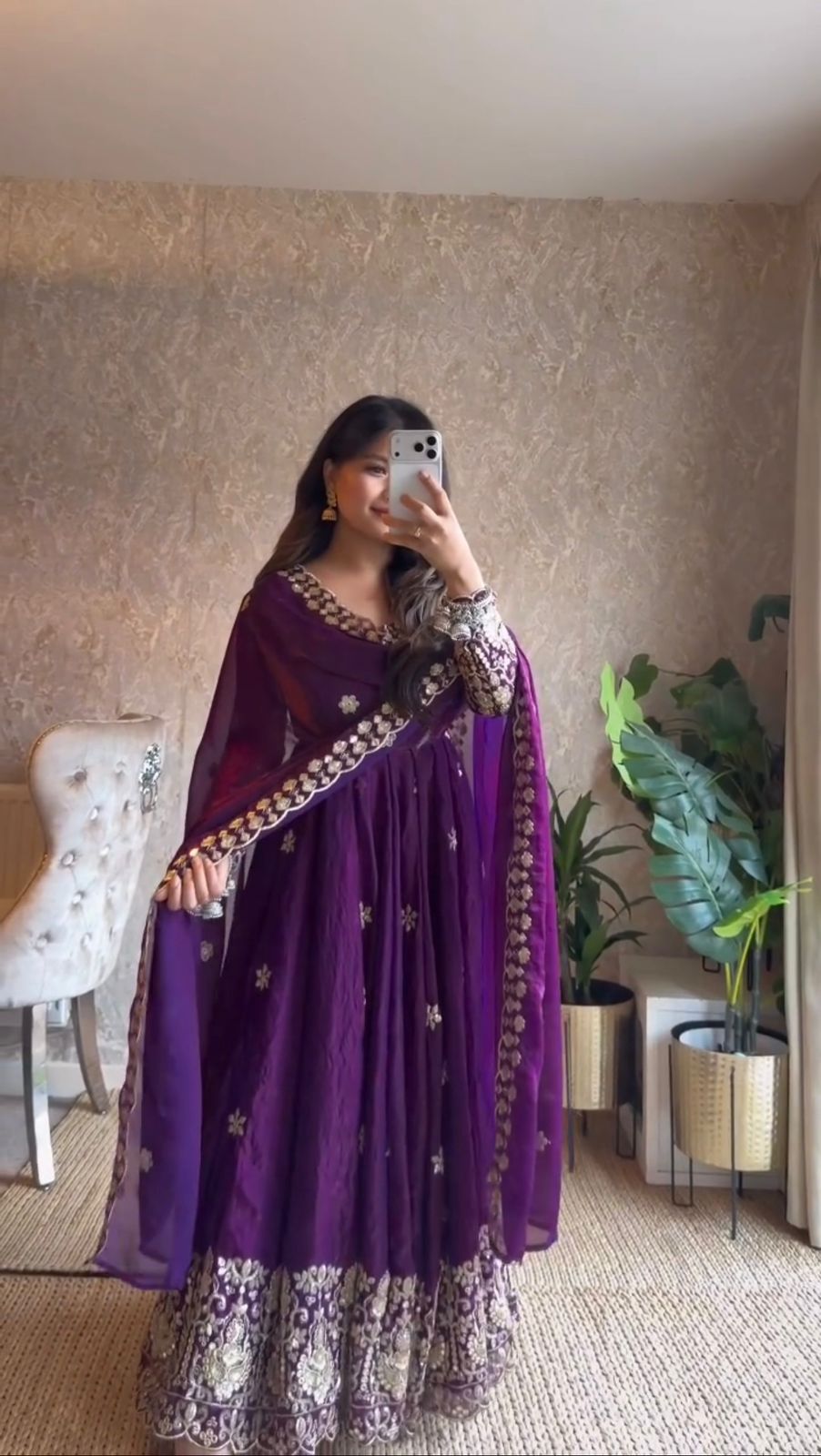 Model wearing Royal Purple Fendy silk Anarkali suit with embroidered dupatta front view