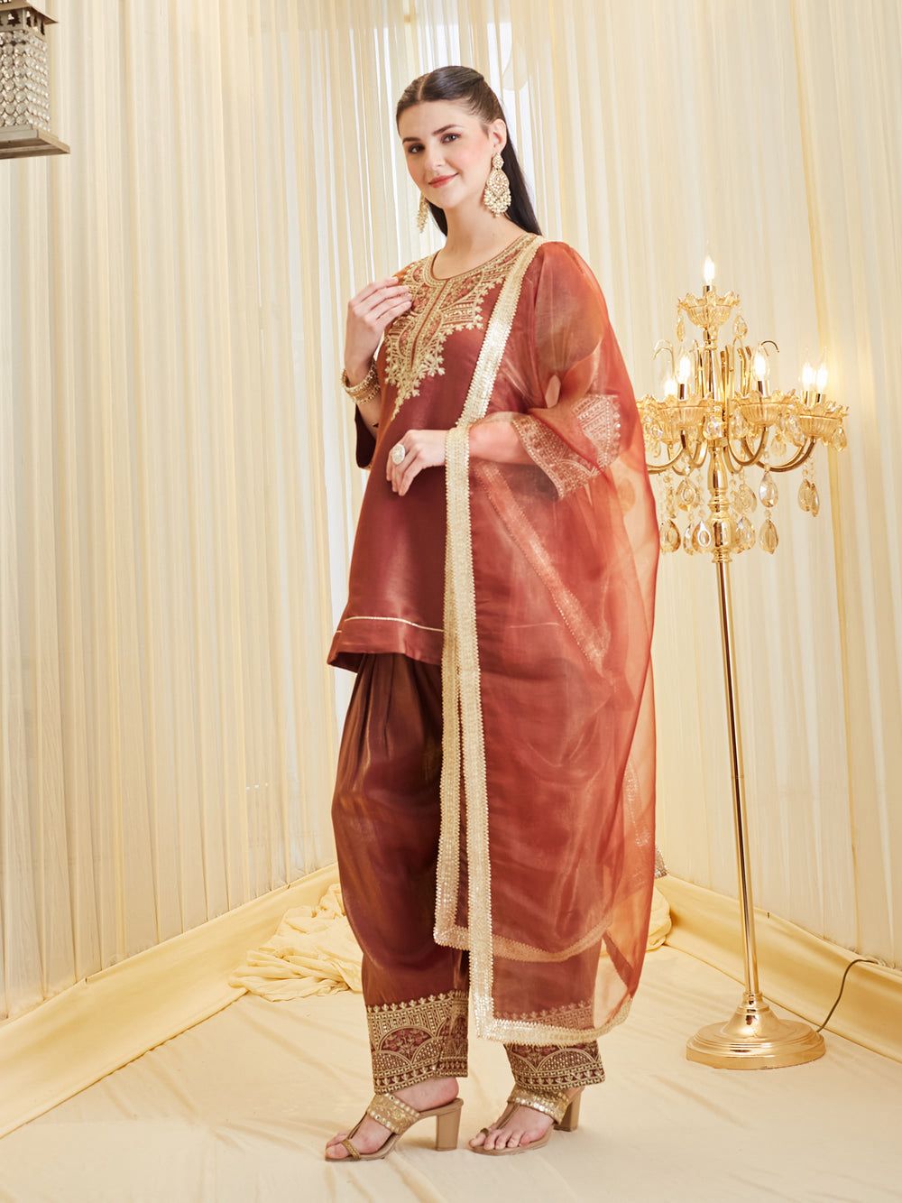 Front side view of rust brown farshi salwar suit with dupatta