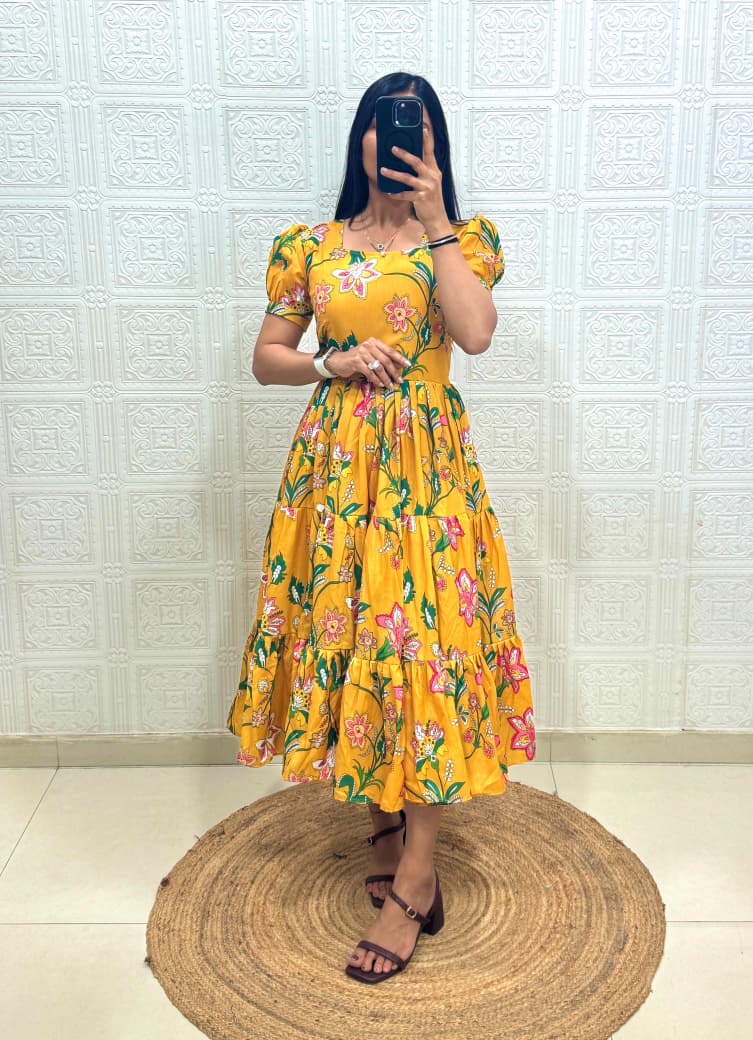 Woman wearing Sunshine Yellow Muslin Cotton floral printed 3 Layer maxi dress