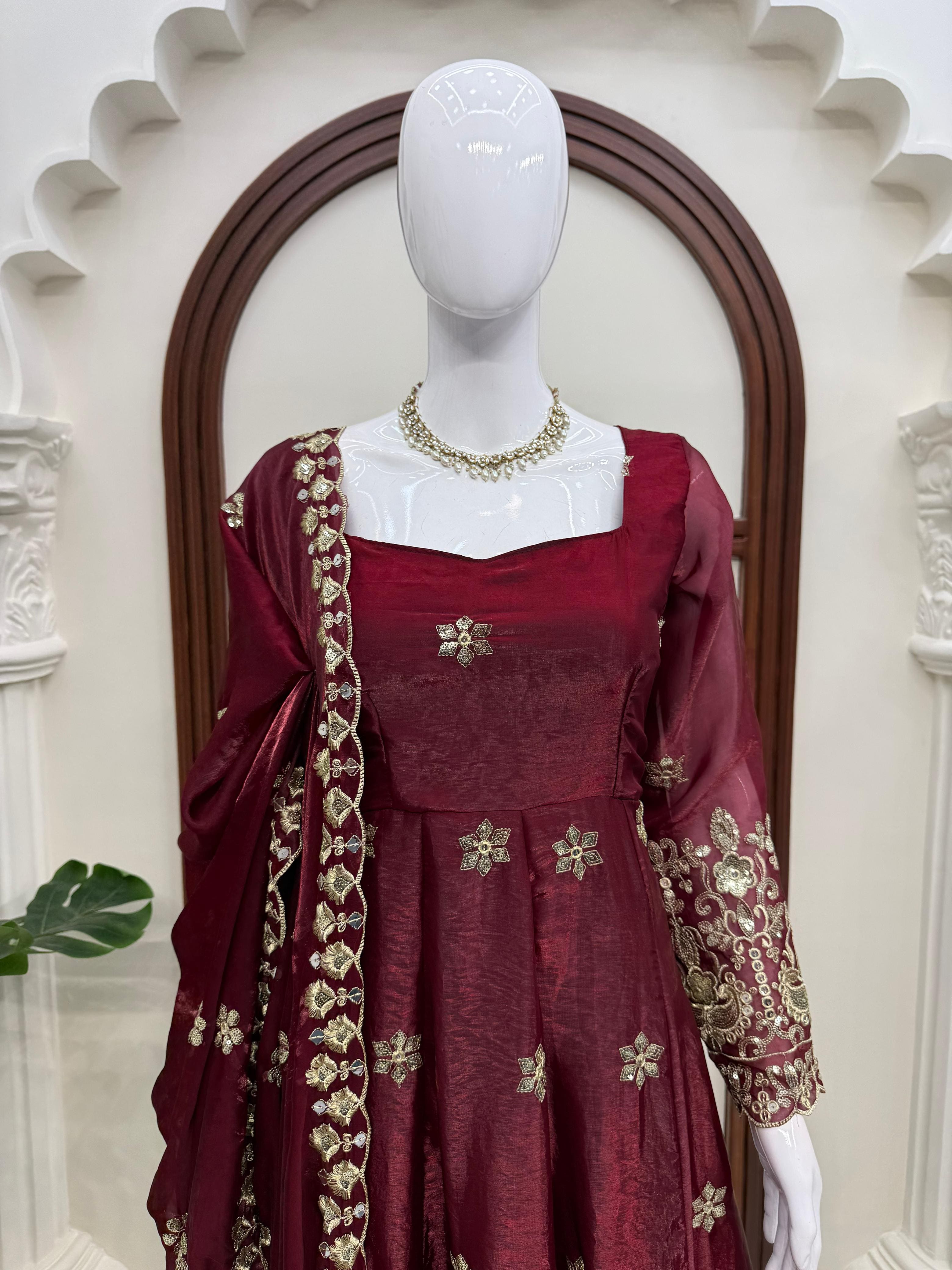 Detailed embroidery work on Wine Burgundy Fendy silk Anarkali suit bodice