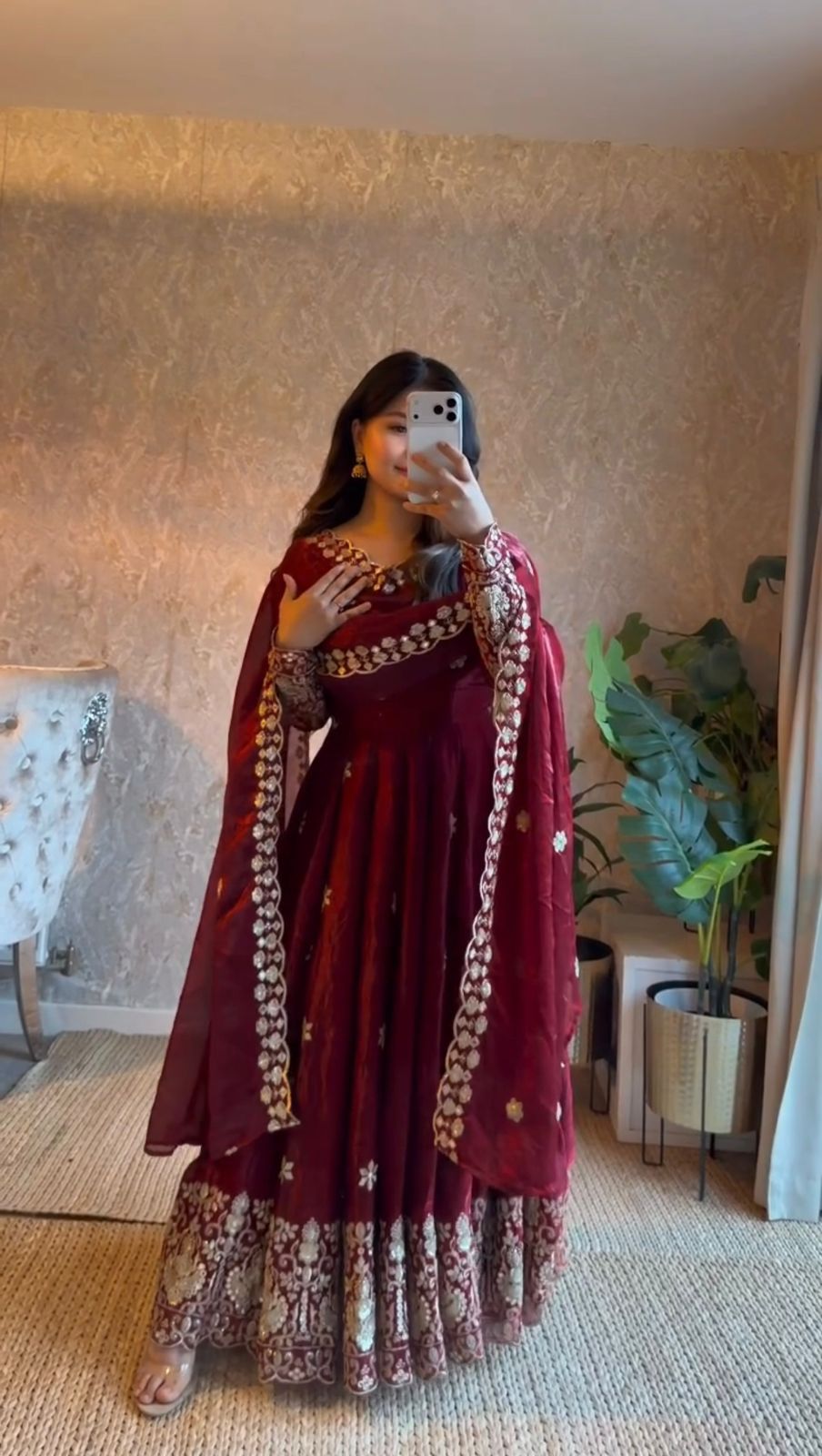 Model wearing Wine Burgundy embroidered Anarkali suit with cutwork dupatta