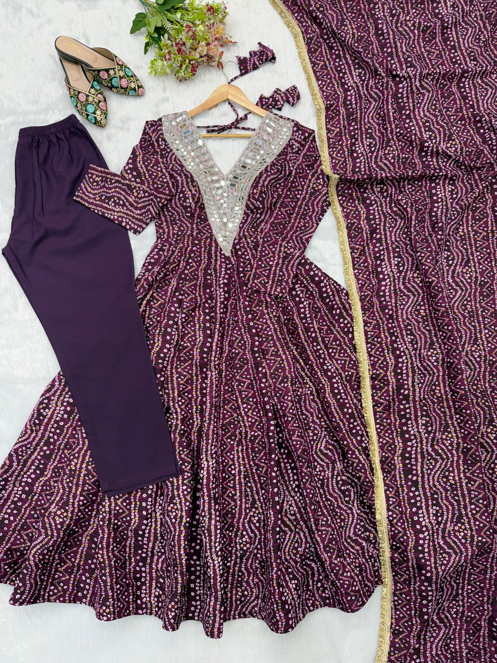 Flat lay of Wine Purple gown pant set with dupatta
