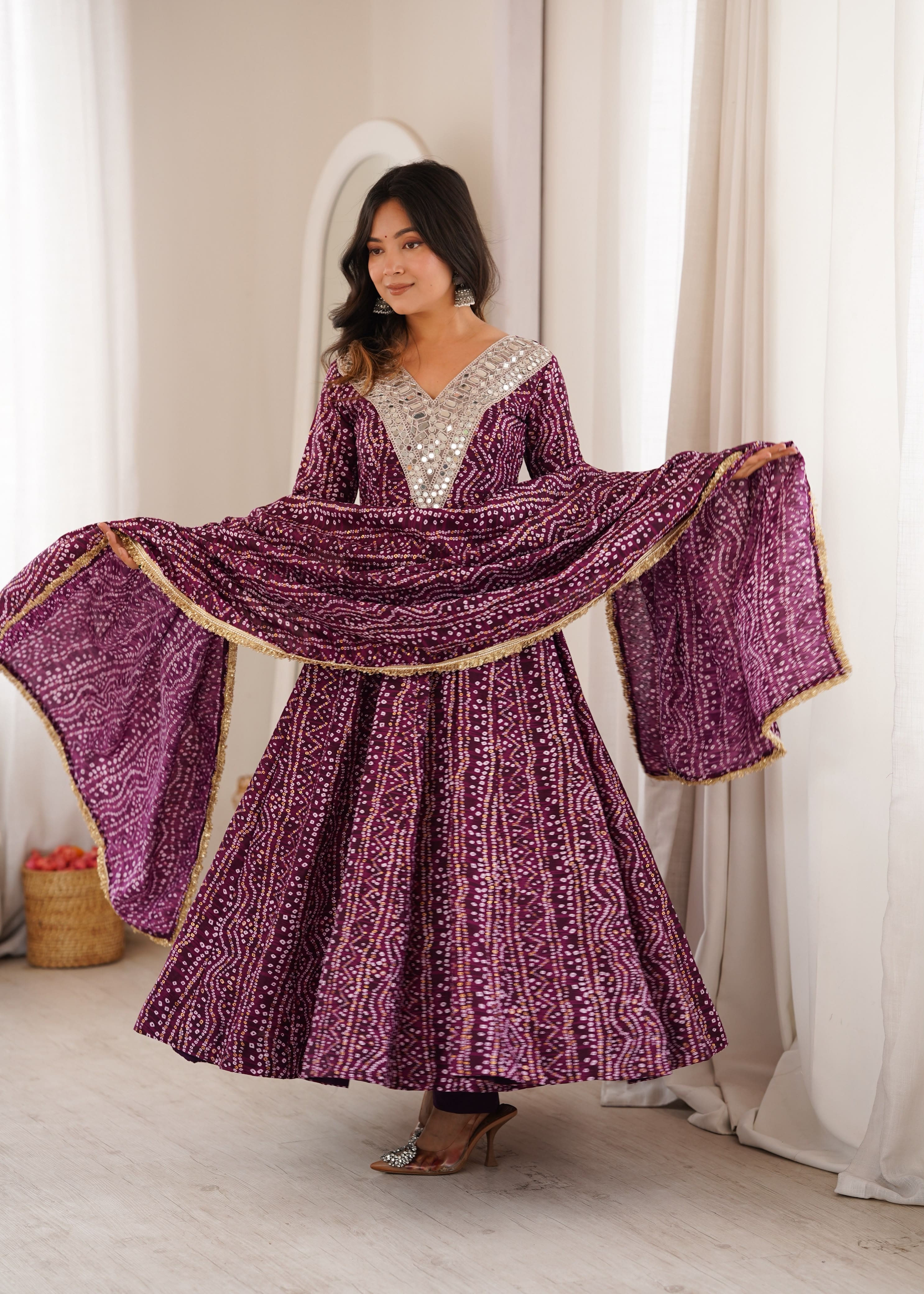 Woman posing in Wine Purple mirror embroidery gown set